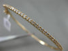 ESTATE .50CT DIAMOND 14KT ROSE GOLD 3D 2mm CLASSIC SHARE PRONG BANGLE BRACELET