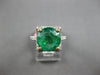 4.49CT DIAMOND & AAA EMERALD 18KT 2 TONE GOLD CLASSIC ROUND HALO ENGAGEMENT RING