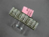ESTATE .60CT DIAMOND 18KT WHITE GOLD ROUND & PRINCESS INVISIBLE ANNIVERSARY RING