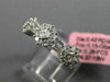 ESTATE .85CT ROUND & BAGUETTE DIAMOND 18KT WHITE GOLD 3 FLOWER ANNIVERSARY RING