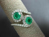 ESTATE 1.55CT DIAMOND & AAA EMERALD 18KT WHITE GOLD LOVE KNOT INFINITY FUN RING