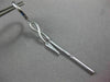 ESTATE LONG .28CT DIAMOND 14KT WHITE GOLD INFINITY LOVE HUGGIE HANGING EARRINGS