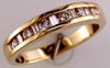 ESTATE .50CT DIAMOND 14KT YELLOW GOLD ROUND & BAGUETTE CHANNEL ANNIVERSARY RING