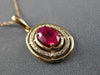 ESTATE .69CT DIAMOND & AAA RUBY 14KT ROSE GOLD 3D CLASSIC OVAL FLOATING PENDANT