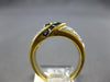 1.20CT DIAMOND & AAA SAPPHIRE 18KT YELLOW GOLD ROUND & BAGUETTE CRISS CROSS RING