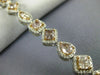 ESTATE 8.84CT WHITE & PINK DIAMOND 18KT WHITE & ROSE GOLD HALO TENNIS BRACELET