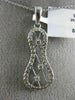 ESTATE .26CT DIAMOND 14KT WHITE GOLD 3D INFINITY ETOILE CRISS CROSS LOVE PENDANT