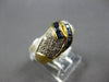 1.20CT DIAMOND & AAA SAPPHIRE 18KT YELLOW GOLD ROUND & BAGUETTE CRISS CROSS RING