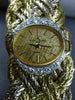 ESTATE LARGE & LONG BAUME & MERCIER .88CT DIAMOND 18K TWO TONE GOLD WOVEN WATCH