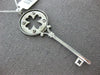 .09CT DIAMOND 14KT WHITE GOLD ETOLIE FOUR LEAF CLOVER KEY TO YOUR HEART PENDANT