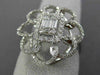 ESTATE LARGE .78CT ROUND & BAGUETTE DIAMOND 18KT WHITE GOLD FLOWER COCKTAIL RING
