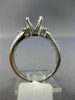 ESTATE .92CT DIAMOND ROUND & BAGUETTE 18KT WHITE GOLD SEMI MOUNT ENGAGMENT RING