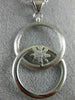 ESTATE LARGE .19CT DIAMOND 18K WHITE GOLD DOUBLE CIRCLE LOVE KNOT FLOWER PENDANT