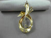ANTIQUE LARGE DIAMOND & AAA EMERALD 18KT 2 TONE GOLD MUSICAL NOTE BROOCH #22500