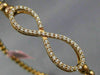 ESTATE .70CT DIAMOND 14KT ROSE GOLD 3D INFINITY FLEXIBLE LOVE BANGLE BRACELET