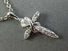 ESTATE SMALL .12CT DIAMOND 14KT WHITE GOLD 3D CROSS INFINITY FLOATING PENDANT