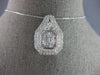 EXTRA LARGE 2.20CT DIAMOND 14KT WHITE GOLD ROUND & BAGUETTE DOUBLE HALO PENDANT