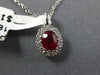 SMALL .62CT DIAMOND & AAA RUBY 18KT WHITE GOLD 3D ROUND & OVAL FLOWER PENDANT