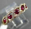 ESTATE WIDE .65CTW DIAMOND & AAA RUBY 14KT ROSE GOLD INFINITY ETOILE FUN RING