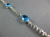 8.14CT DIAMOND & AAA BLUE TOPAZ 14KT WHITE GOLD 3D OVAL & ROUND TENNIS BRACELET