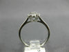 ESTATE .50CT ROUND DIAMOND 14KT WHITE GOLD CLASSIC SEVEN STONE FLOWER LOVE RING