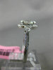 ESTATE .78CT WHITE & YELLOWW DIAMOND 18K WHITE GOLD CLASSIC HALO ENGAGEMENT RING