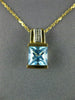 ESTATE 1.46CT DIAMOND & AAA BLUE TOPAZ 14KT 2 TONE GOLD ROUND & PRINCESS PENDANT