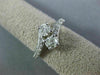 ESTATE WIDE 1.0CT ROUND DIAMOND 14KT WHITE GOLD TWO STONE CRISS CROSS LOVE RING