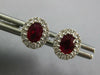 1CT DIAMOND & AAA RUBY 18KT WHITE GOLD OVAL & ROUND FLOWER CLASSIC STUD EARRINGS