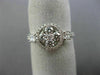 ESTATE WIDE .82CT DIAMOND 18K WHITE GOLD 3D ROUND FLOWER HALO FILIGREE LOVE RING