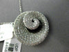 ESTATE LARGE 1.34CT DIAMOND & ONYX 18KT WHITE GOLD SWIRL SHELL FLOATING PENDANT