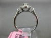 ESTATE .78CT WHITE & YELLOWW DIAMOND 18K WHITE GOLD CLASSIC HALO ENGAGEMENT RING