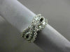 ESTATE 1.99CT BAGUETTE DIAMOND 18KT WHITE GOLD 3D CRISS CROSS INFINITY LOVE RING
