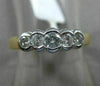 ESTATE .75CT DIAMOND 14KT WHITE & YELLOW GOLD 5 STONE GRADUATING SEMI BEZEL RING