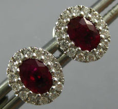 1CT DIAMOND & AAA RUBY 18KT WHITE GOLD OVAL & ROUND FLOWER CLASSIC STUD EARRINGS