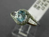 ESTATE .48CT DIAMOND & AAA OVAL CUT AQUAMARINE 14KT WHITE GOLD 3D LOVE KNOT RING