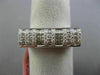 ESTATE .60CT ROUND & PRINCESS DIAMOND 18KT WHITE GOLD RECTANGULAR INVISIBLE RING