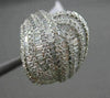 ESTATE 2.15CT BAGUETTE & ROUND DIAMOND 18KT WHITE GOLD INTERTWINNING FUN RING