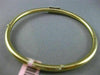 ESTATE .42CT DIAMOND 14KT WHITE & YELLOW GOLD SQUARE BOW CLASSIC BANGLE BRACELET