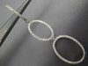 ESTATE .93CT DIAMOND 18KT WHITE GOLD 3D DOUBLE OPEN OVAL HUGGIE HANGING EARRINGS