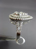 LARGE 18KT WHITE GOLD ENGAGEMENT RING. 3D CLUSTER PEAR SHAPE DOUBLE HALO DESIGN