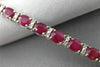 ESTATE WIDE 12.22CT DIAMOND & RUBY 18K WHITE GOLD CLASSIC OVAL TENNIS BRACELET