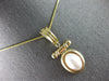 ESTATE LARGE AAA MOTHER OF PEARL 14KT YELLOW GOLD OVAL ENHANCER FLOATING PENDANT