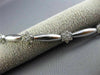 ESTATE LONG 1.40CT DIAMOND 14KT WHITE GOLD 3D FLOWER BY THE YARD TENNIS BRACELET
