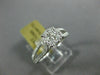 ESTATE .66CT DIAMOND 14KT WHITE GOLD 3D CLASSIC INVISIBLE ROUND ENGAGEMENT RING