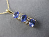 ESTATE 1.06CT DIAMOND & AAA TANZANITE 14KT YELLOW GOLD 3 STONE JOURNEY PENDANT