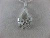 ESTATE .52CT ROUND & BAGUETTE DIAMOND 14KT WHITE GOLD TEAR DROP FLOATING PENDANT