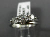 ESTATE .91CT DIAMOND 14KT WHITE GOLD 3D PAST PRESENT FUTURE TENSION RING #14161