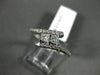 ESTATE .56CT DIAMOND 14KT WHITE GOLD 2 STONE CRISS CROSS SEMI ETERNITY LOVE RING