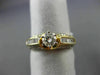 ESTATE 1.20CT ROUND & BAGUETTE DIAMOND 14KT YELLOW GOLD CLASSIC ENGAGEMENT RING